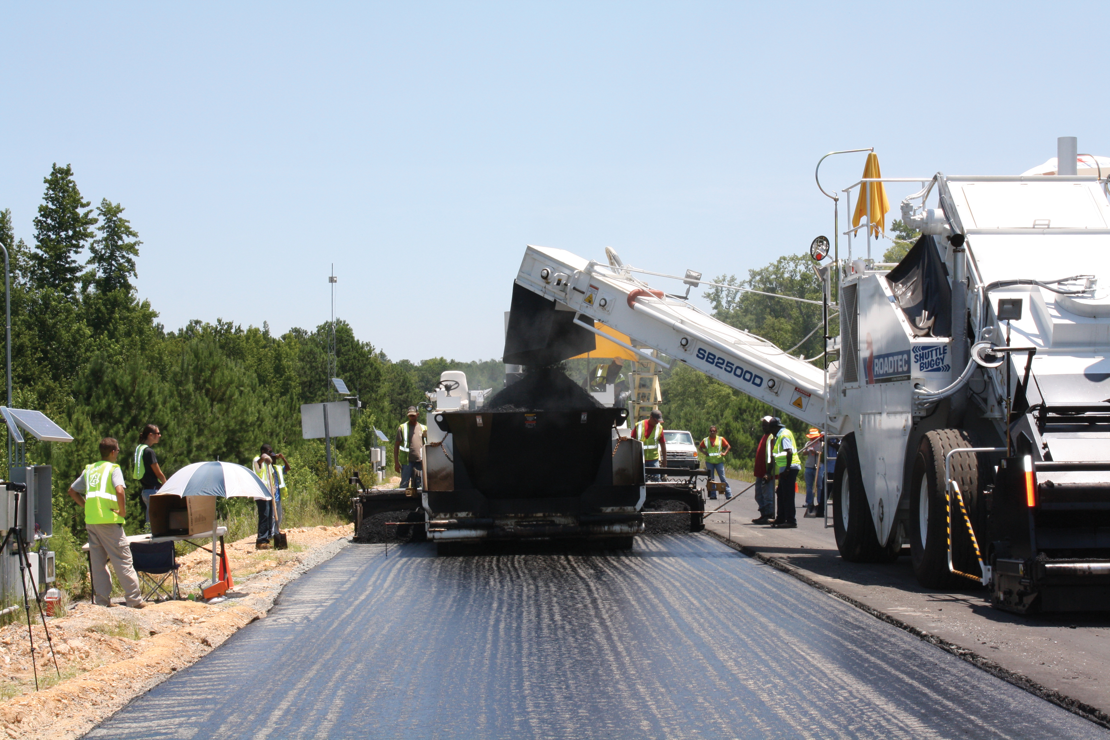 The NCAT test facility in Alabama is used to monitor the performance of road materials using heavily laden trucks being driven continuously over the track to simulate highway conditions monitor the performance of road materials