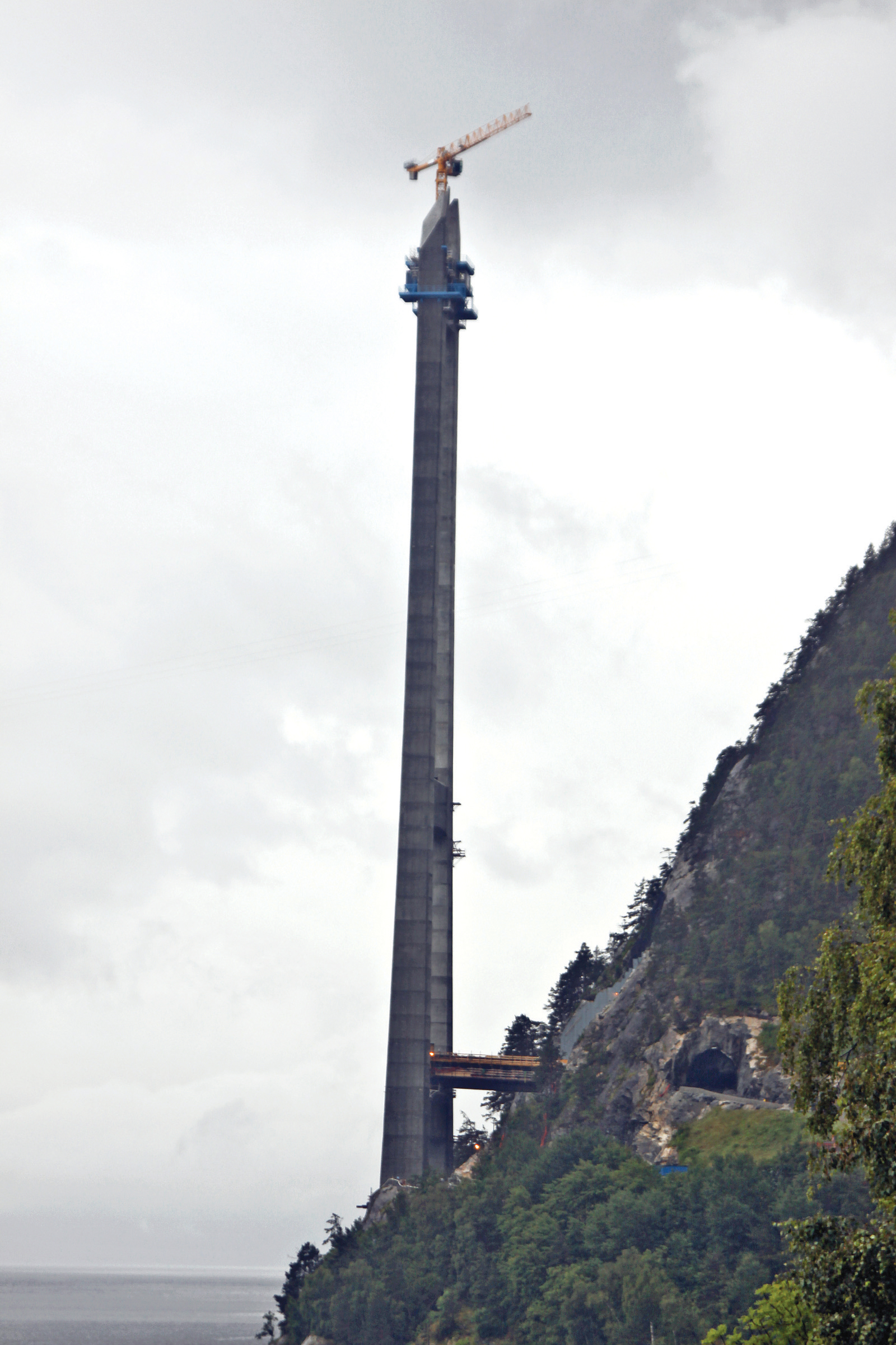 Two Potain MDT 128 topless cranes are playing a vital role in building the Hardanger Bridge in Norway Potain MDT 128 topless cranes