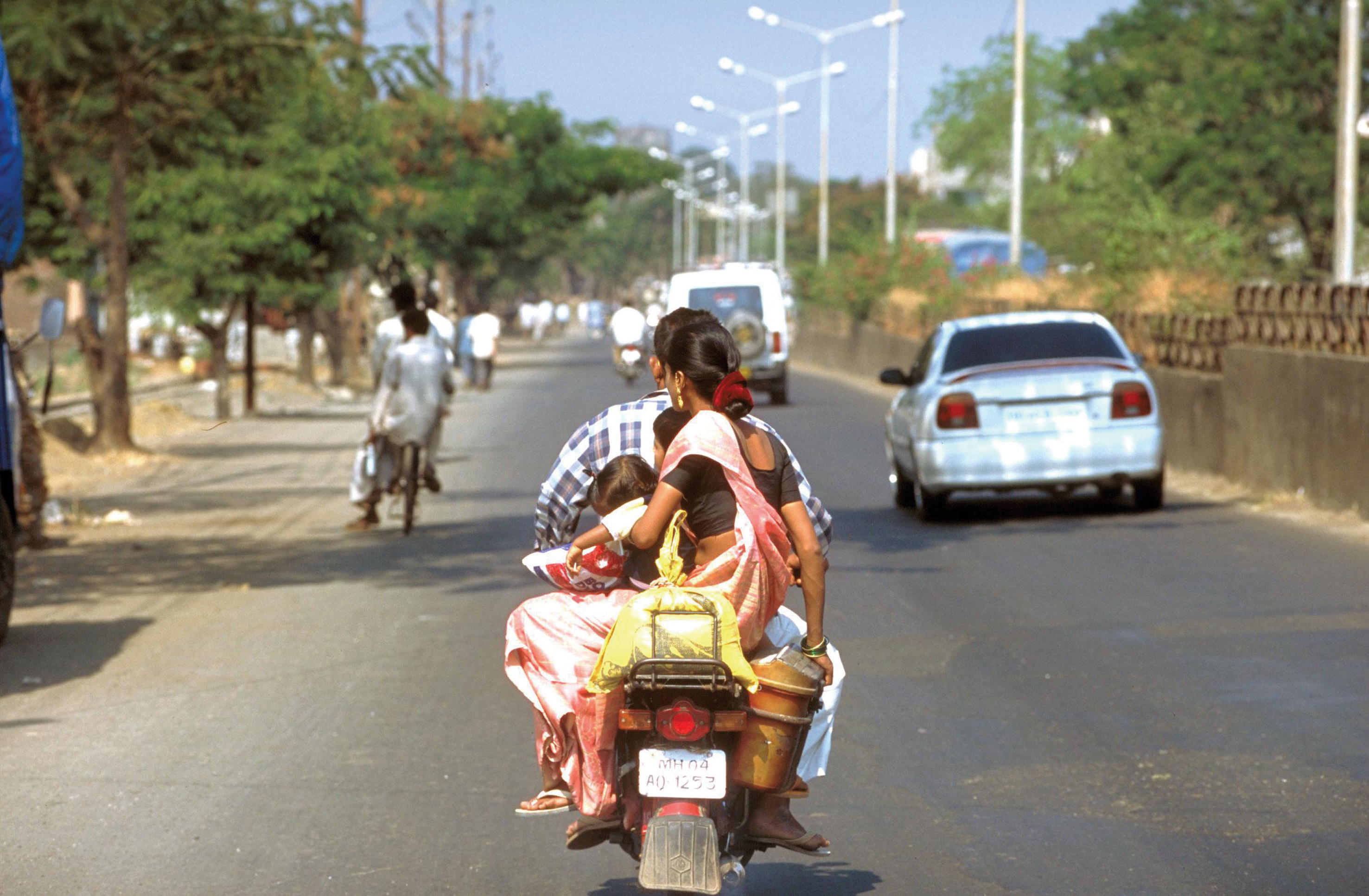 Many users of two-wheel vehicles are very vulnerable Lady on bike