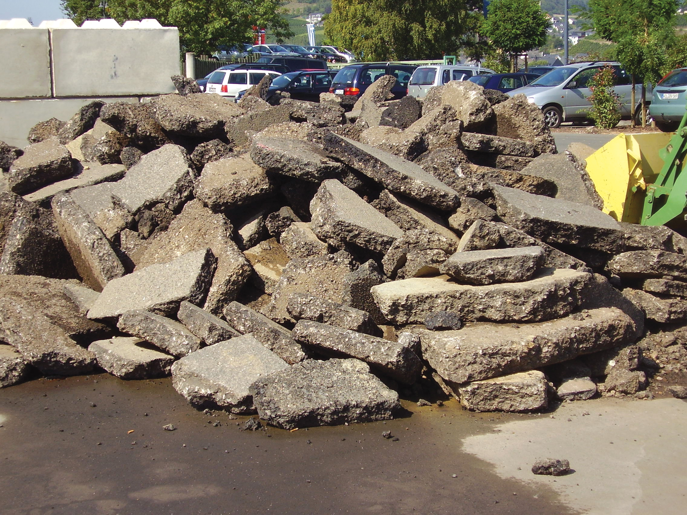 Recycled asphalt pavement can benefit from additives to rejuvenate bitumen content Pile of broken concrete