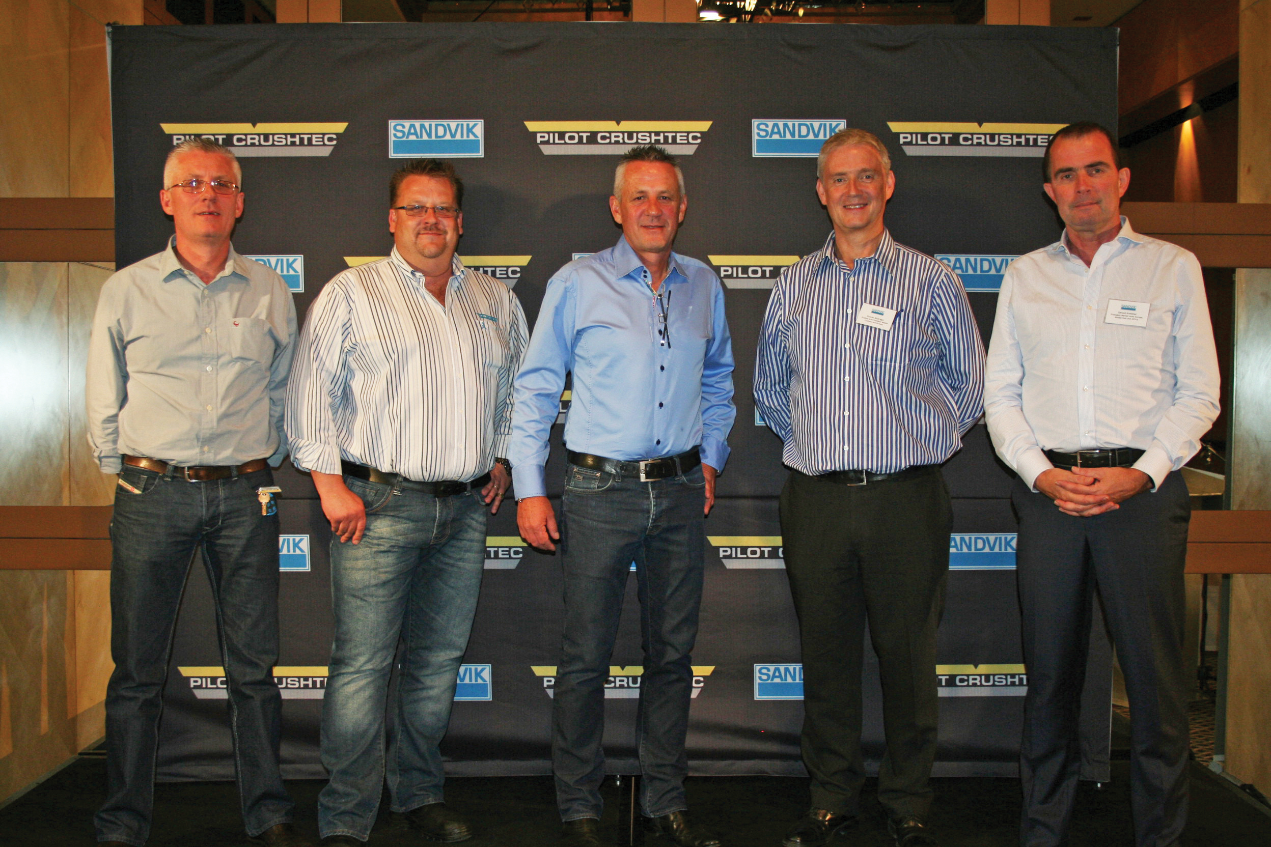 After the appointment (from left ) are Pilot Crushtec's Frank Scherf, Graham Kleinhans and Sandro Scherf with Sandvik's Duncan McGregor and Gerald Kreisc Sandvik's Pilot Crushtec team
