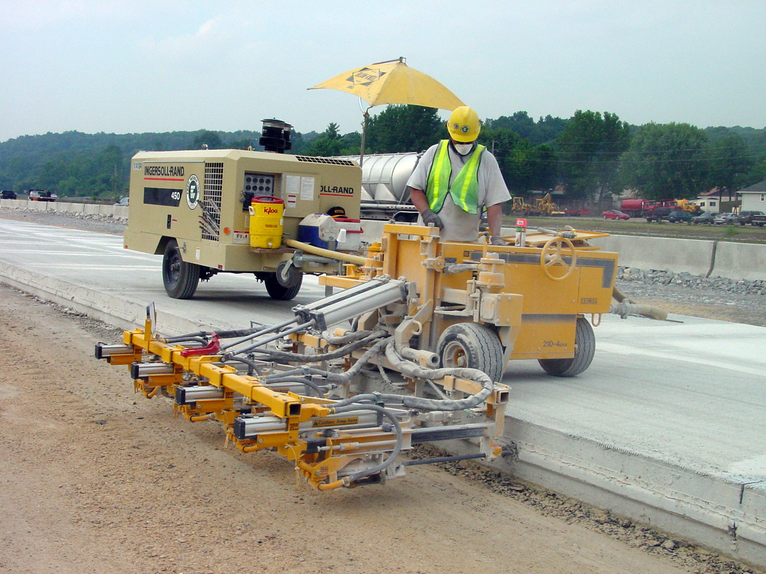 When operating multi-gang units, adjust feed pressure on each individual drill first, then further adjust if needed when running simultaneously for the first time. multi-gang unit in operation