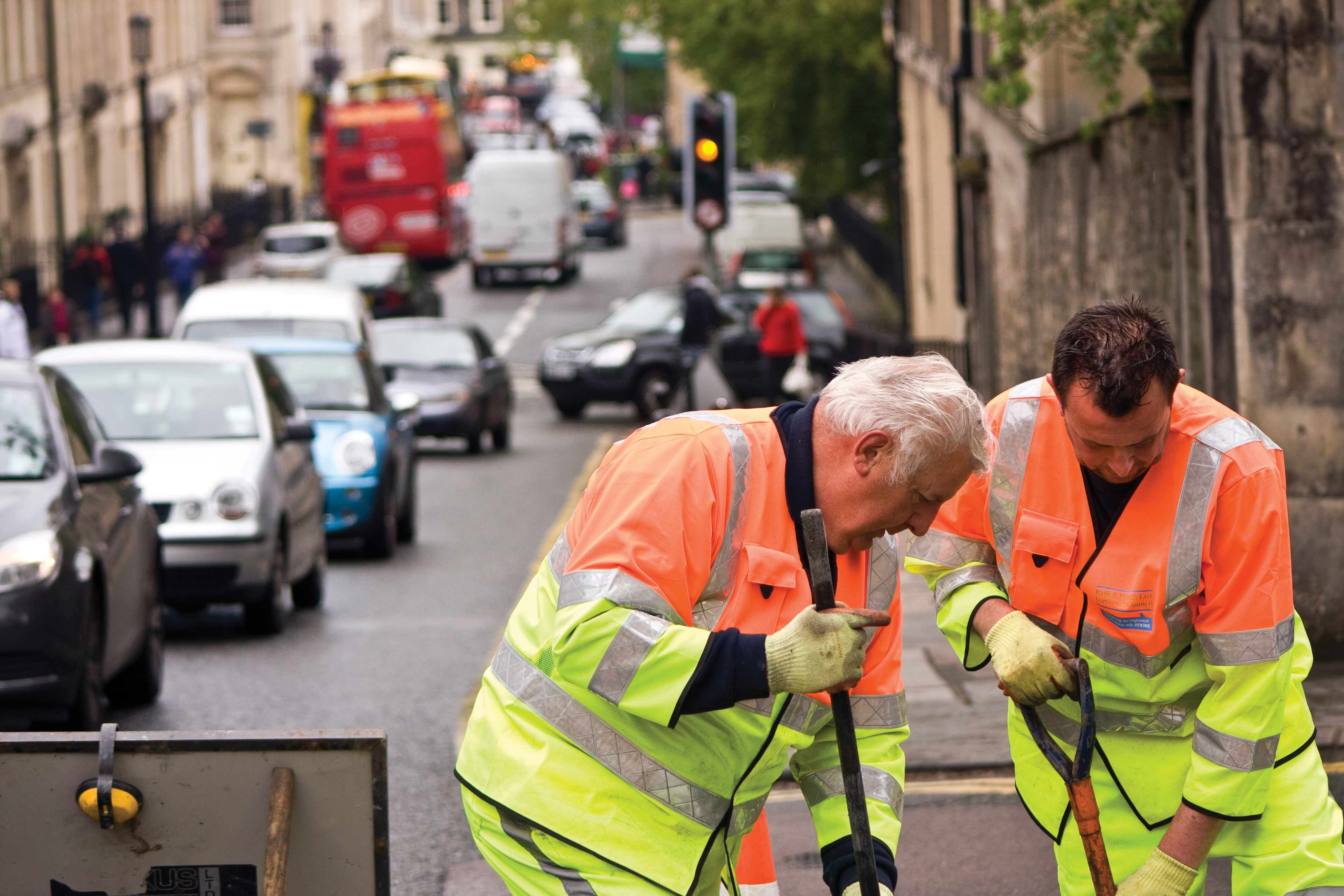 An Atkins roadworker team at work in Bath, England Atkins roadworker team
