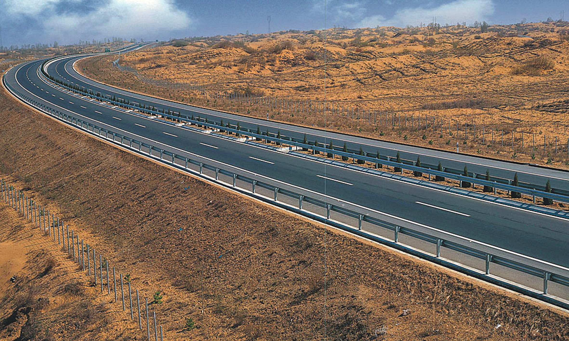 China's desert expressway is providing a tough construction challenge China's desert expressway