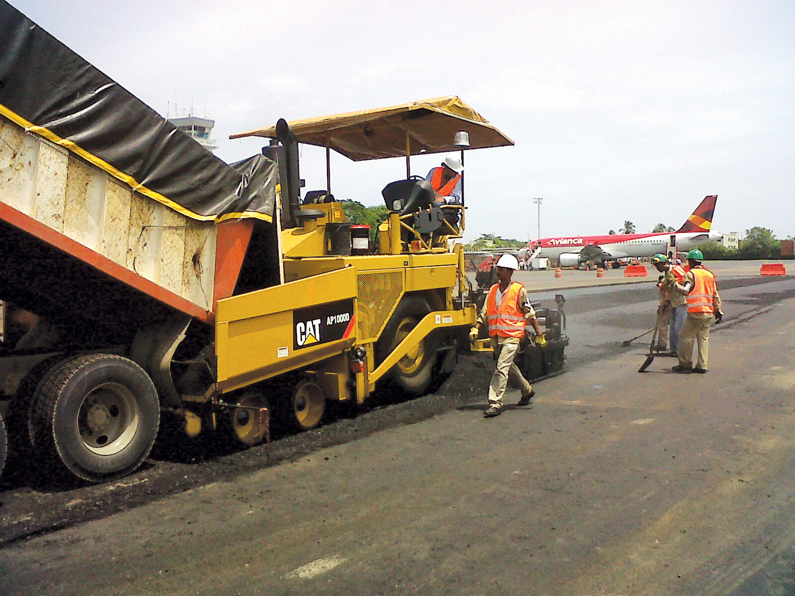 Caterpillar compactors and pavers helded reconstruct the runway for Cartagena airport in Colombia Caterpillar compactors and pavers