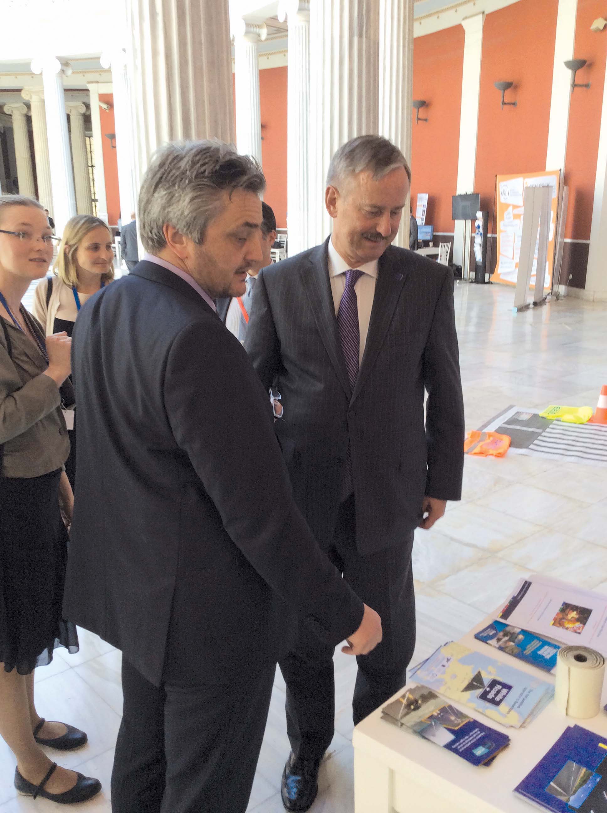 ERF Vice President Rik Nuyttens talking to European Commission Vice President Siim Kallas at the ERF stand during the Informal EU Transport Ministers Council meeting ERF Vice President Rik Nuyttens with Siim Kallas