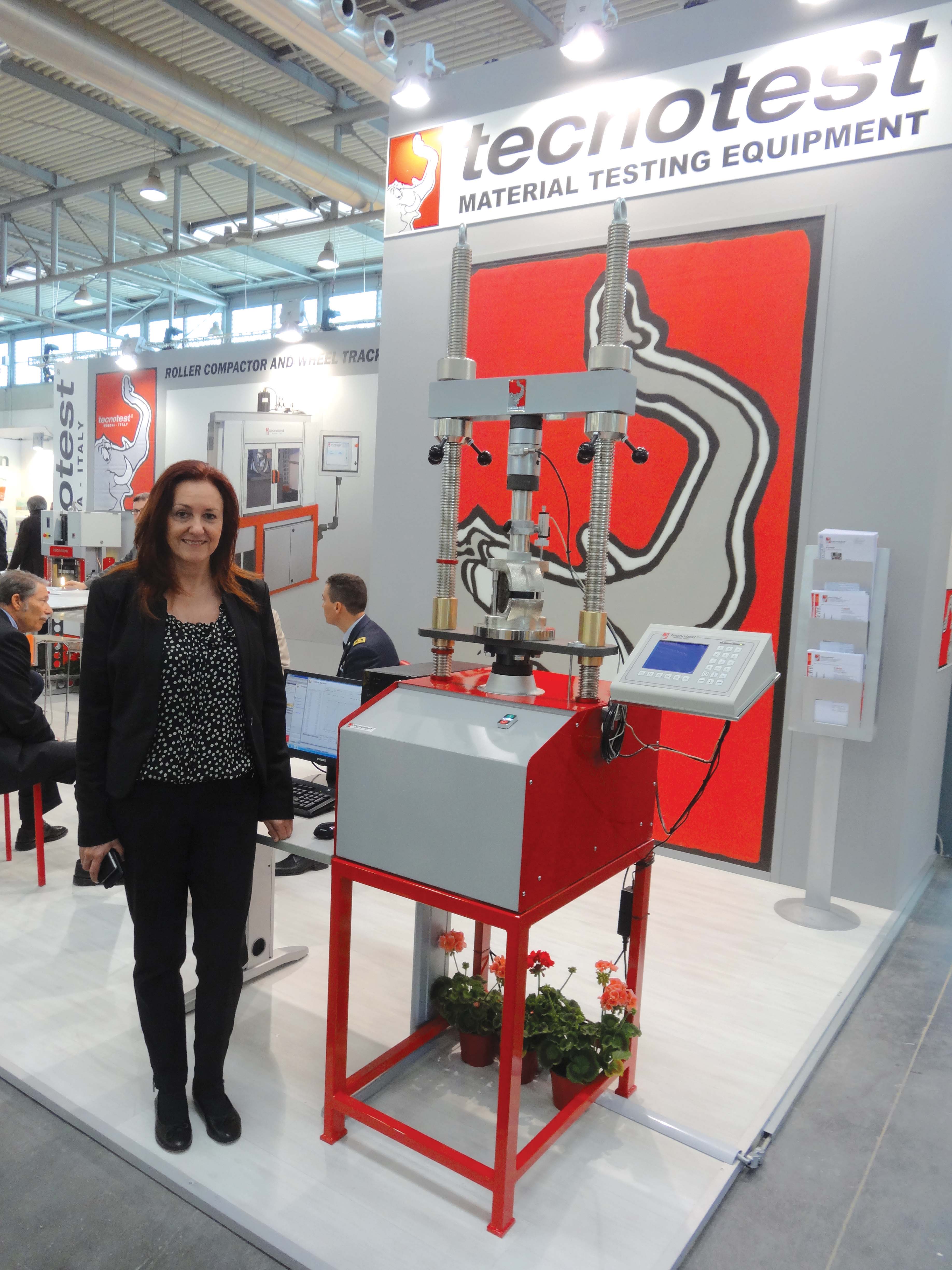 Patricia Sarson, Tecnotest’s overseas sales manager, with the company’s T100-E02 variable speed testing machine Patricia Sarson -Tecnotest T100-E02