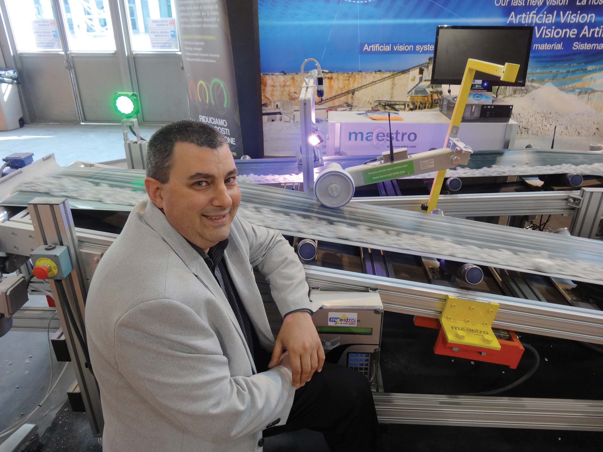 Riccardo De Agostini, Ma-estro senior technician, by a model demonstrating the firm’s Q-Automation technology for quarries and aggregate recycling plants Riccardo De Agostini, Ma-estro senior technician