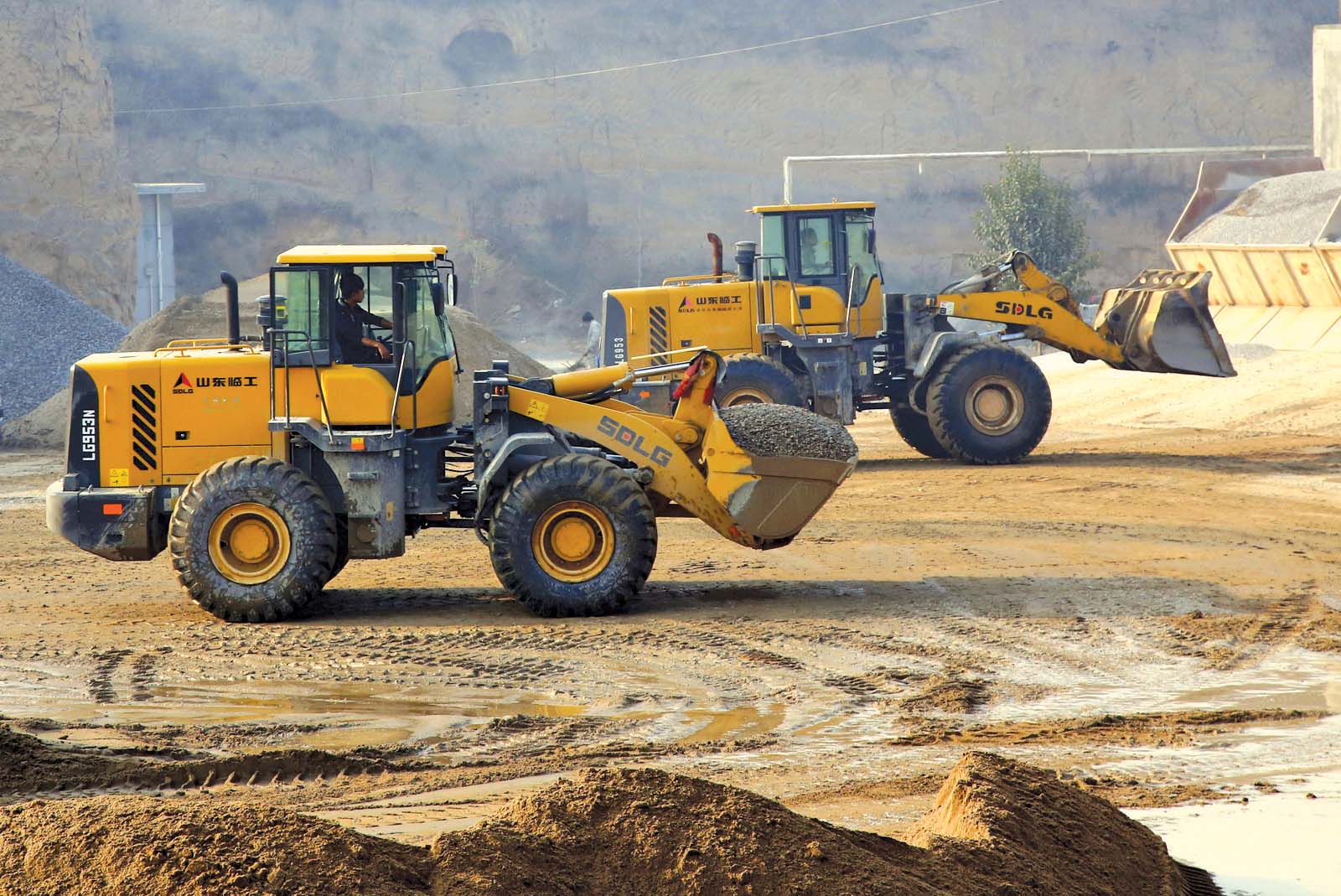 A fleet of SDLG wheeled loaders is helping a Chinese concrete producer meet demand SDLG wheeled loaders helping chinese concrete producer