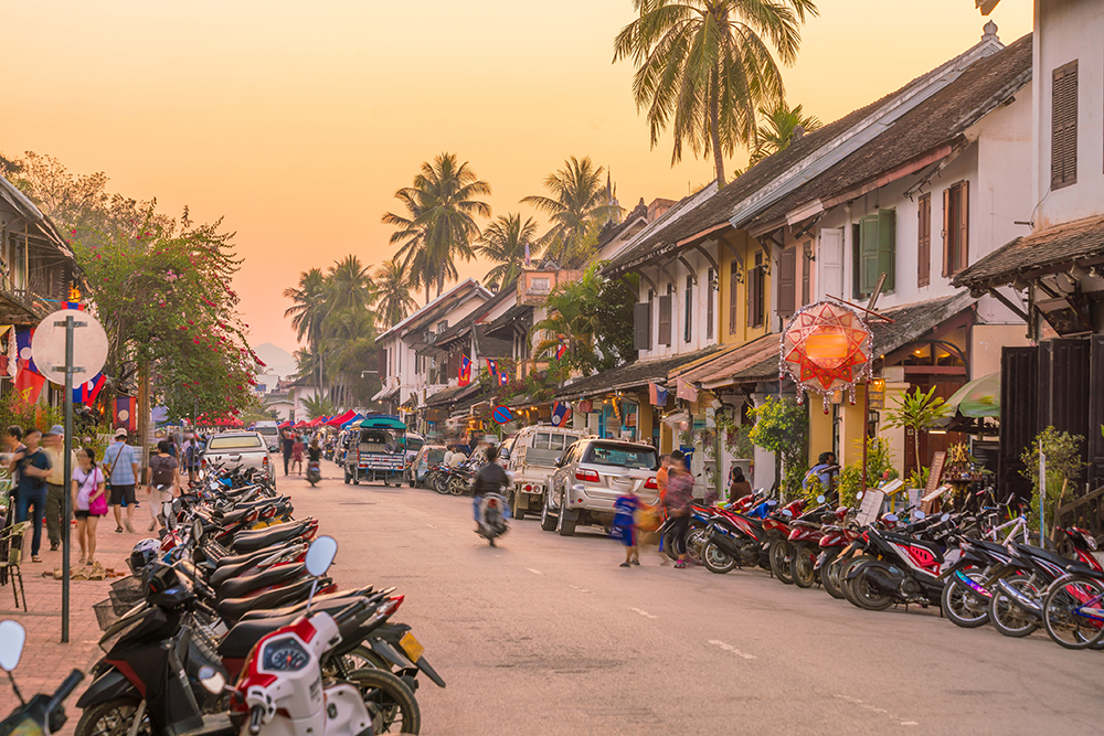 Small capacity motorcycles and scooters are predominant for urban personal transport in Lao PDR, as in many Southeast Asian nations © F11photo | Dreamstime.com