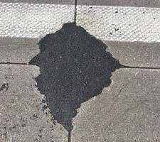 Macismo International suits repairs of pothole