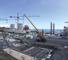 A wide array of cranes is being used on road construction work 