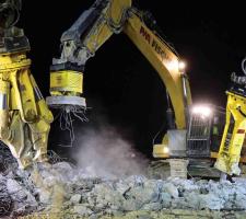 fleet of excavators fitted with hydraulic attachments 