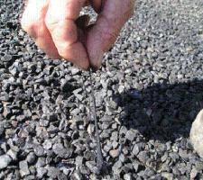 man testing minerals