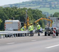 Aximum vehicle restraint systems being installed