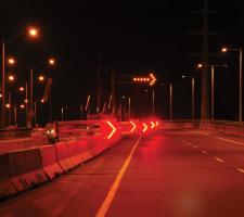 remotely-controlled lane closure system