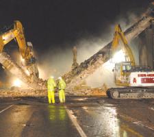 Powerful demolition tools removing the bridge 