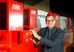 Matteo Goich, Matec Industries CEO, with a prototype of Twin Freccia Rossa, the world’s biggest filter press   