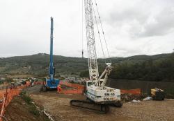 Soilmec piling machines are carrying out piling work for a road widening project in Italy