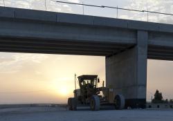 caterpillar machine in the sunset