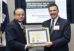 Dennis Slater, AEM accepting award