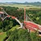 arched bridge crosses the Oparno Valley