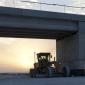 caterpillar machine in the sunset