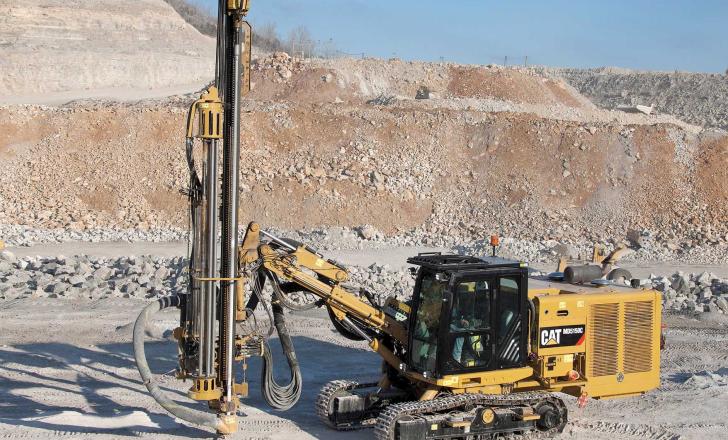 Caterpillar MD5150C Top Hammer Drill working at Tower Rock Caterpillar MD5150C Top Hammer Drill