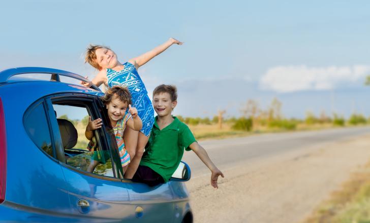 Here at last, and about time, too. kids in a car
