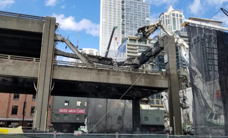 Coming down: Demolition of Seattle’s Alaska Way Viaduct, a 1950’s structure, began this winter (pic courtesy Philip Renaud) July 2019-US-AlaskaWayDemo-NEWS.jpg