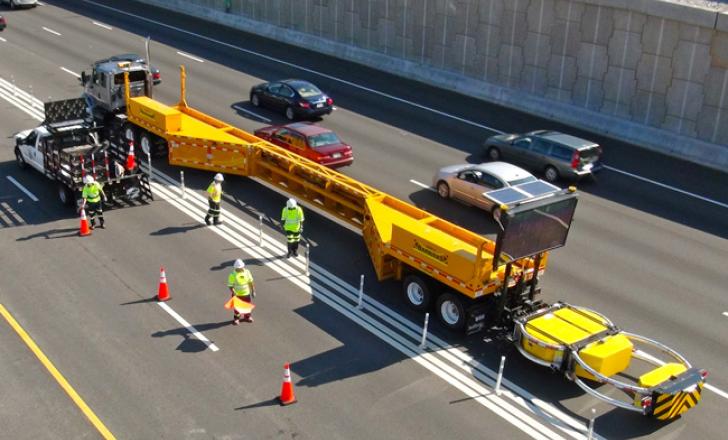 The MBT-1 can protect areas to either the right or the left side of the road, depending on to which end of the barrier that the semi-tractor is attached eRST - TruckMobileBarriers.jpg