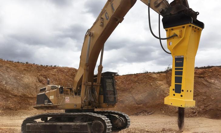 An Epiroc HB 7000 breaker on an excavator at Son Amat limestone quarry in Mallorca An Epiroc HB 7000 breaker on an excavator at Son Amat limestone quarry in Mallorca