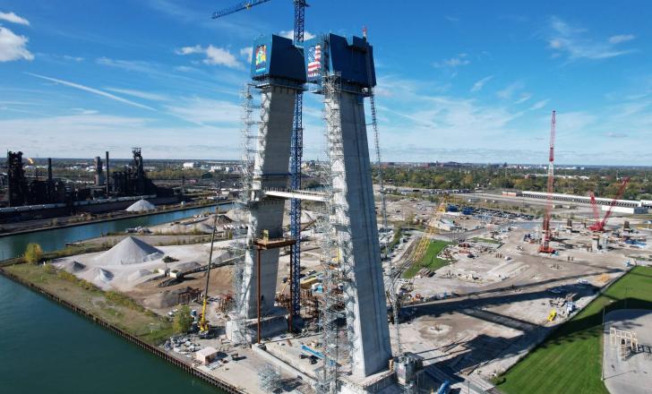 Temporary struts are connecting and supporting both pairs of towers as they continue to climb on opposite banks of the Detroit River, which is the border between Detroit in the US and the Canadian city of Windsor (image courtesy Windsor-Detroit Bridge Authority)