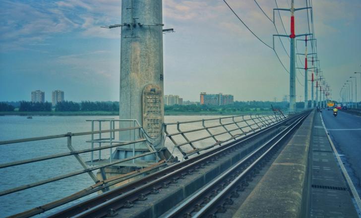 The multi-purpose bridge, also called the Jamuna River Bridge, carries a four-lane carriageway, two rail lines, a high voltage power line and a high-pressure natural gas pipeline (image © Zobaer Alom/Dreamstime)