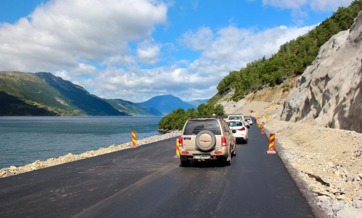 Better but safer? New asphalt on a coastal road near Ullensvang, Norway (image © Andrii Zhezhera/Dreamstime)