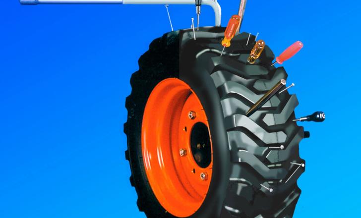 Air-Seal Products is demonstrating its pre-puncture tyre sealant range by banging nails and spikes into a tyre. pre-puncture tyre sealant range