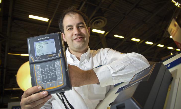 Loadrite's Simon Rush with the on-board weighing systems Loadrite On-board weighing system