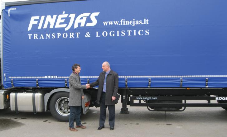 Aidas Plascinskas, commerical director UAB Finejas and Mariys Vitkauskas, manging director UAB Transuore with one of the cargo trailers Kogel