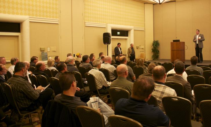 Delegates listen to a presentation at a previous AEMP Symposium AEMP