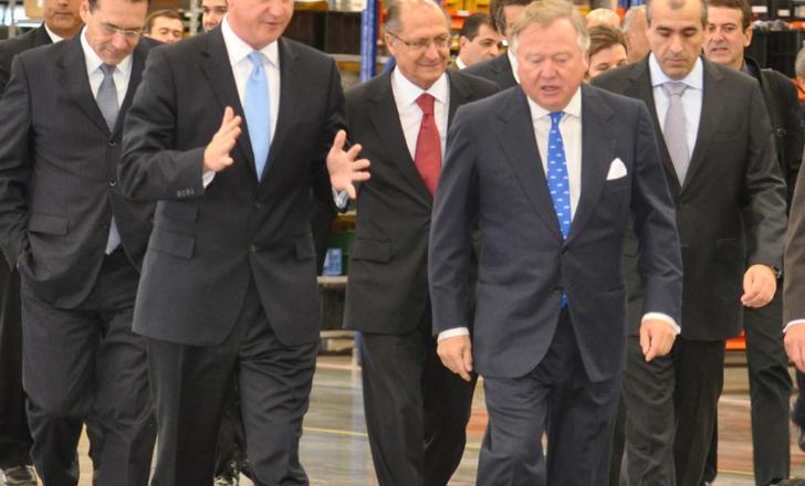 Prime Minister David Cameron and JCB chairman Sir Anthony Bamford lead a VIP delegation through JCB Brazil's new factory JCB meets Prime Minister