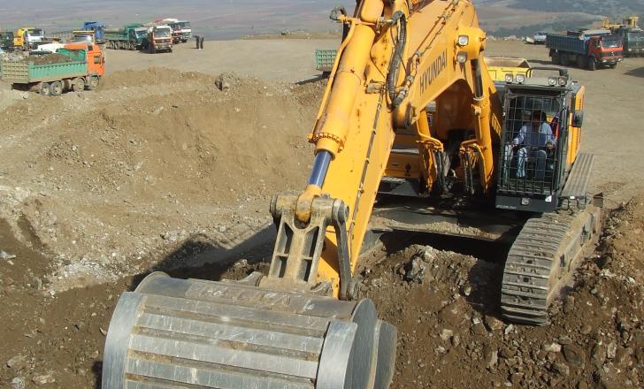 Greek highway projects have been hit hard by the country’s economic crisis excavator working on Greek's highway