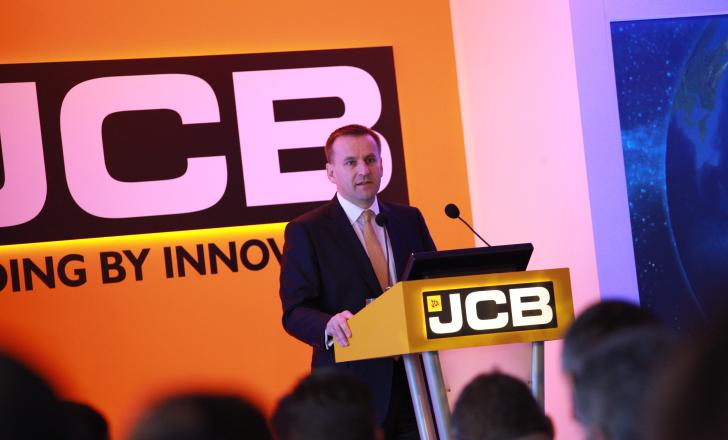 JCB’s chief operating officer Graeme Macdonald announcing record profits Bauma 2013 Daily JCB Graeme Macdonald