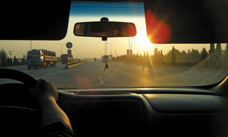 The sun is rising on a new dawn in road construction projects for China sun is rising - vie from the car